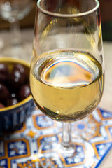 Fortified wine from Andalusia, Spain, different types of sherry in glasses and olives, colors of Andalusisa