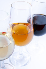 Fortified wine from Andalusia, Spain, different types of sherry in glasses on white background