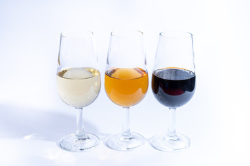 Fortified wine from Andalusia, Spain, different types of sherry in glasses on white background