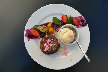 fruit with ice cream and chocolate muffin