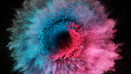 Coloured powder explosion on black background