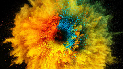 Coloured powder explosion on black background
