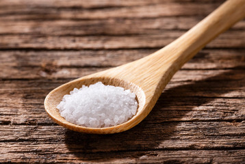 sea salt on wooden spoon