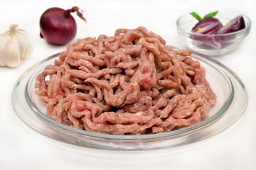 minced meat on a plate on a white background