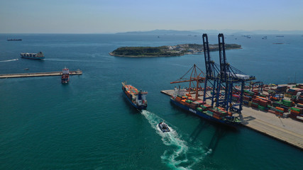 Aerial drone photo of industrial cargo container terminal of Perama near commercial port of Piraeus, Attica, Greece