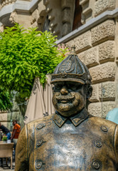Fototapeta na wymiar Bronze street statue of a policeman on a street in Budapest, Hungary