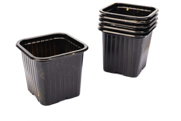 used black plastic gardening bucket
