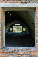 window of old abandoned hangarwindow of an old abandoned concrete rocket hangar
