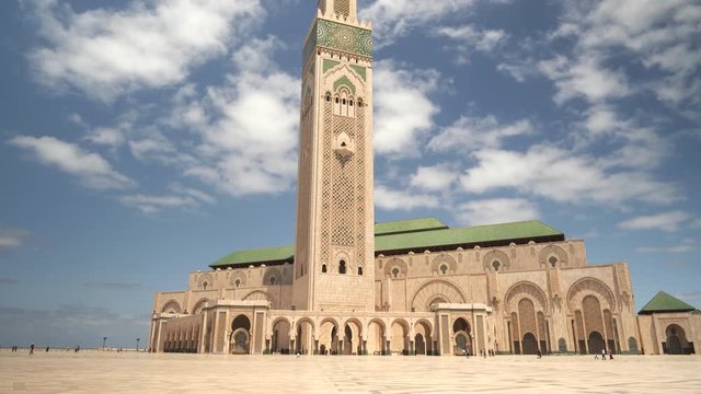 day time wide tilt up shot of hassan ii mosque in casablanca, morroco