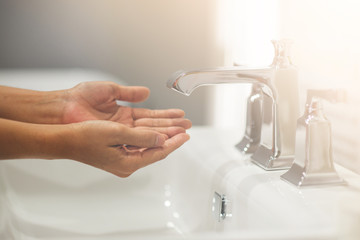Focus on hands, cleaning hands after touching things for cleanliness from germs or viruses. Hand cleaning concept To prevent dirt.