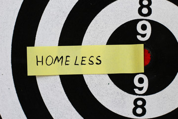 Sticker text: Homeless in the center of the target.