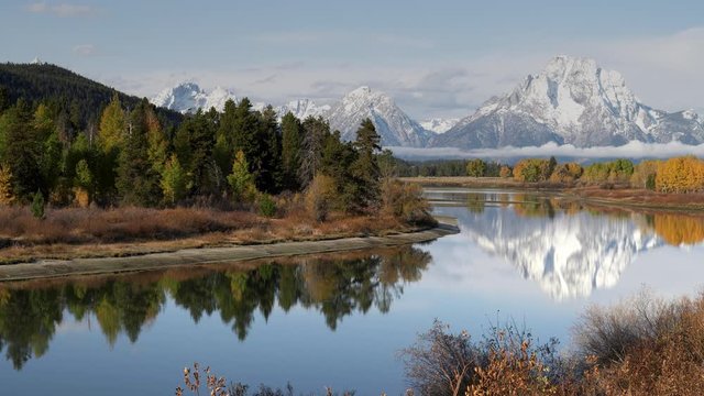 morning panning right clip of oxbow bend at grand teton national park after an autumn snow storm