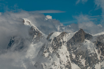 Mountains shrouded in clouds from the Aiguille du Midi