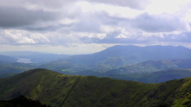 Time lapse of clouds over mountains wild places UK 4K