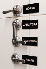 gas faucets with description in industrial kitchen