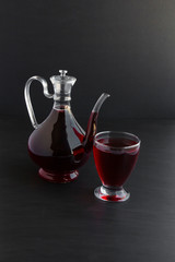 Fragrant red rose syrup (sherbet) in stylish glass pitcher and glass.Composed of ottoman style.Cold,sweet drink of Ramadan.