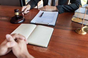 Male Notary lawyer or judge consult or discussing contract papers with Businessman client in office, Law and Legal services concept