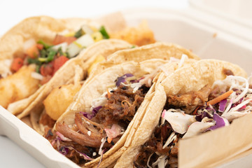 Mexican take out street food pork and fish tacos