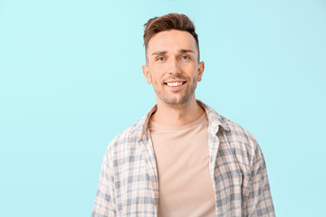 Fototapeta premium Happy man on color background