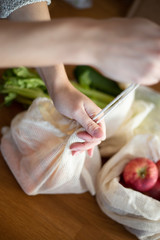 Obraz na płótnie Canvas Reusable cotton bag for vegetables and fruits
