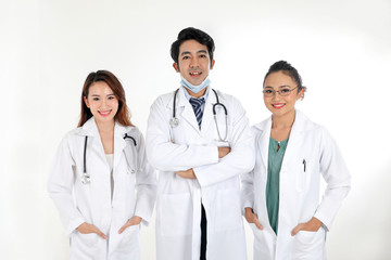 Fototapeta premium Asian Malay Chinese male female three doctors posing confident smile looking at camera on white background