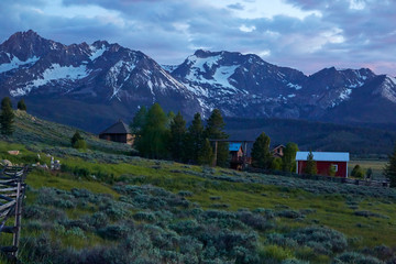 Fototapeta na wymiar Night time photo of a ranch at the base of the Rocky Mountains in Idaho