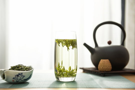 High end fresh green tea and tea in water