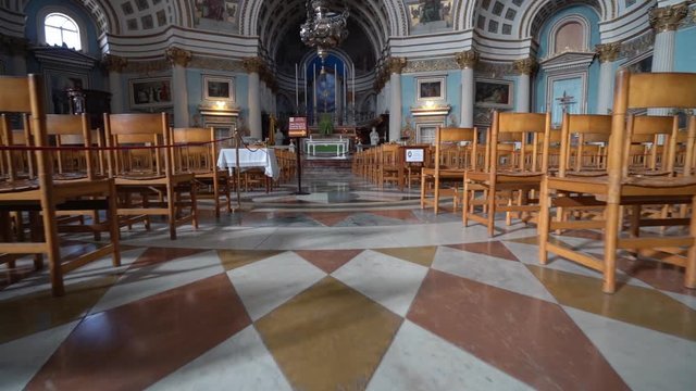 low angle shot inside a large empty church in malta europe
