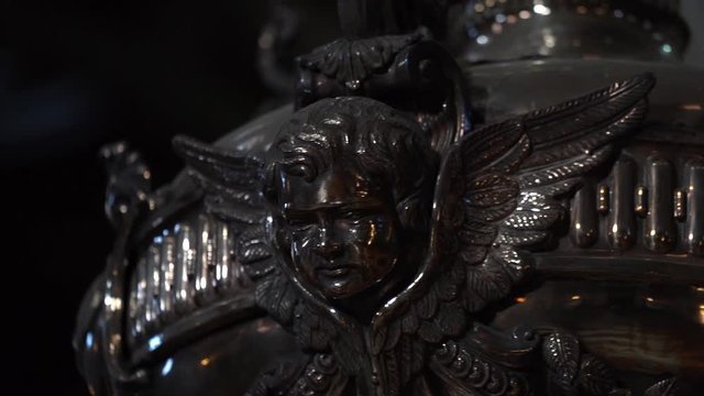 Slow motion silver angel decorative art inside church