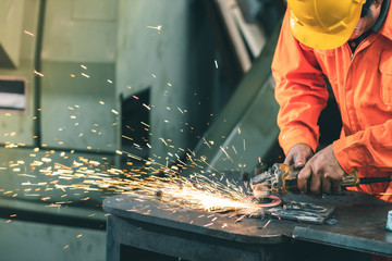 Industrial Engineers in Hard Hats.Work at the Heavy Industry Manufacturing Factory.industrial...