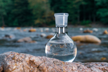 Glass flask with clean drinking water.