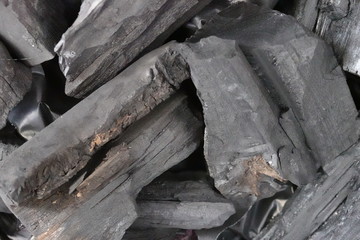 A Pile of Dark Wood for background