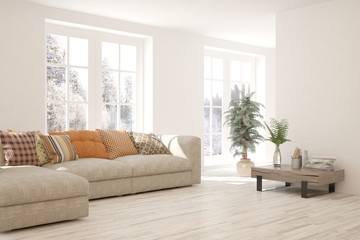 White living room with sofa and winter landscape in window. Scandinavian interior design. 3D illustration