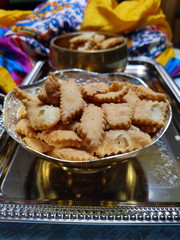 Namakpara (Khurma, Nimki, Mathri) which are  crispy, crunchy and savory strips in a bowl.