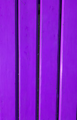 boards painted with purple paint wooden fence, wall, vertical background