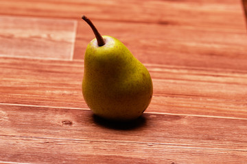 green one big fruit stands on a beautiful table