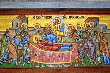 Beautiful mosaic showing the Dormition of the Virgin Mary outside of a Christian orthodox church in Athens, Greece