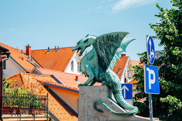 Ljubljana symbol dragon sculpture at Dragon Bridge Zmajski most in Ljubljana, Slovenia