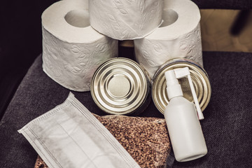 Toilet paper 3 rolls and spray antiseptic in a bottle, coronavirus