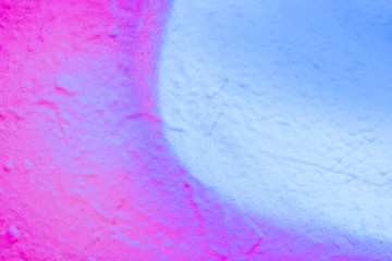 Beautiful bright colorful street art graffiti background. Abstract creative spray drawing fashion colors on the walls of the city. Urban Culture, black ,blue, purple , violet , neon texture