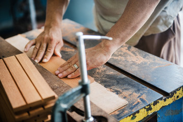 man woodworking in a shop