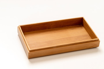 open wooden box top view on white background