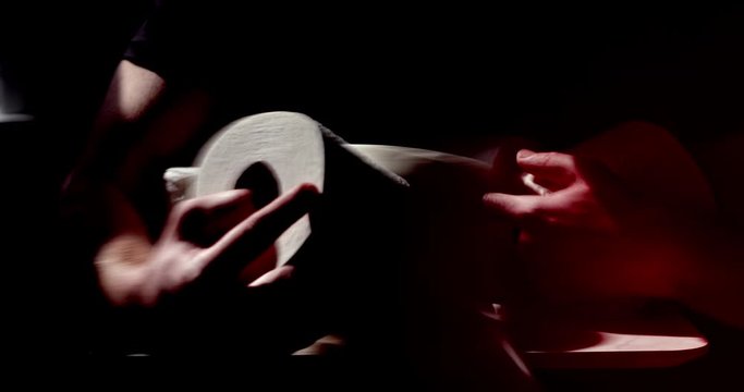 A man steals rolls of toilet paper during the COVID-19 coronavirus quarantine social distancing experience in March 2020 due to price gouging and profiteering.