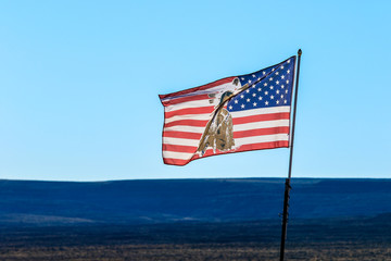 View to the Flag in the Red Rocks, Monument Valley, USA