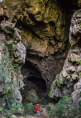 grand entrance of a hidden cave in Laos