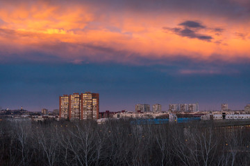sunset over the city of Belgrade - landmark under orange skies