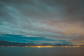 Panorama of the lake of Leman or Lac Leman on a cold winter night. Late night panorama of Lac Leman.