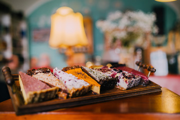 Delicious vegan cake slices. Eat healthy concept. Non dairy and gluten free products. 