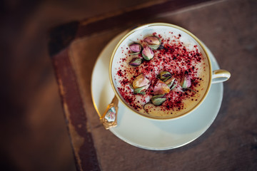 Hot chocolate served with flower decoration. New barista style. 
