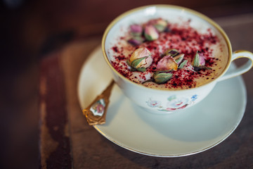 Hot chocolate served with flower decoration. New barista style. 